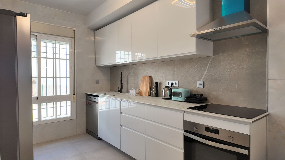 Casa Adosada de 4 Dormitorios en venta en Benalmádena